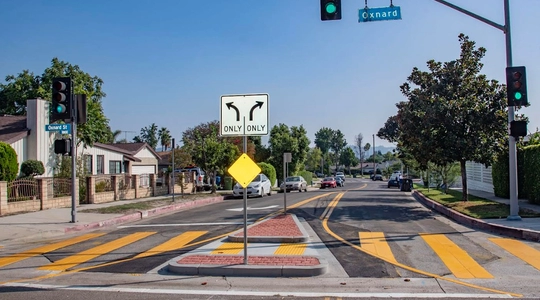 Freshly installed median strip and road striping on Radford Avenue.