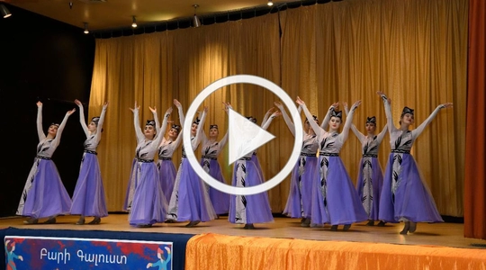 Women in Purple Dresses dancing 