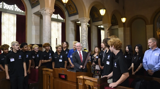 Council President Krekorian presents congratulatory certificates to North Hollywood High School baseball team in Council Chamber.