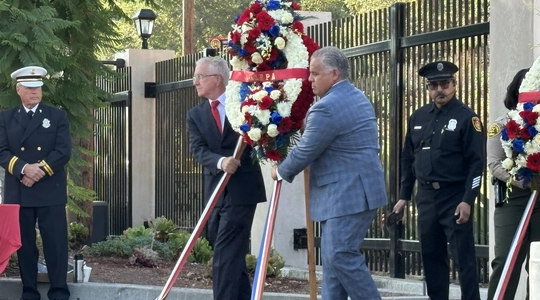 Placing a wreath at the memorial to the fallen heroes of 9/11: City Council President Paul Krekorian and Freddy Escobar, President of the United Firefighters of Los Angeles.