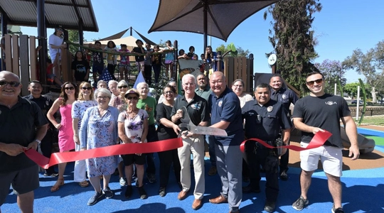 A picture of the ribbon cutting at Laurel Grove Park.