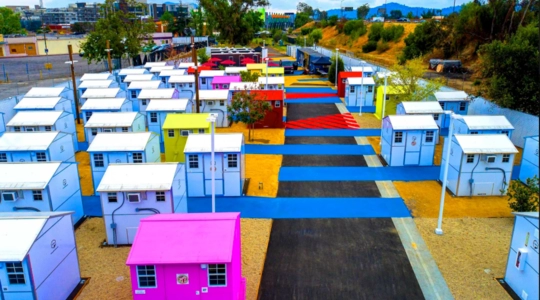 Aerial view of colorfully painted Tiny Homes