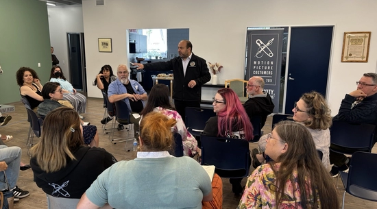 Councilmember Nazarian, standing, addresses seated members of the Costumers Guild.