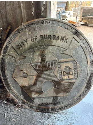 An image of the bronze plaque stolen from the City of Burbank.