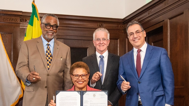 mayor Bass display sifged budget ordinance with Councilmembers Price, Krekorian and Blumenfield.