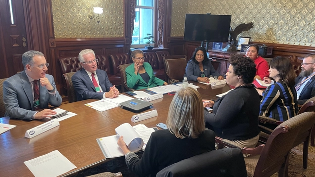 Council President and Mayor Bass at conference table with Director of OMB Shalanda Young.