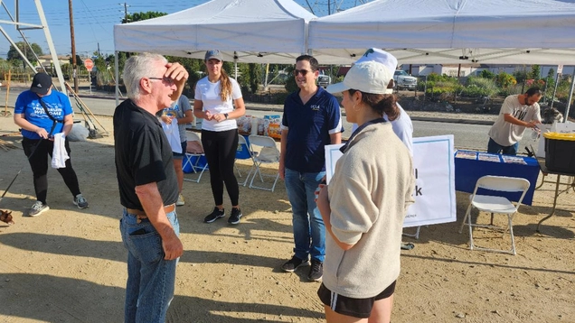 Council President Emeritus Krekorian speaks with the volunteers.